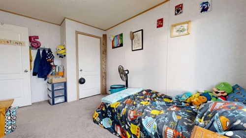 8810 90 Street, Grande Prairie, AB - Indoor Photo Showing Bedroom
