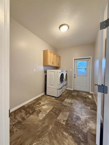 9005 Forest St, La Crete, AB - Indoor Photo Showing Laundry Room
