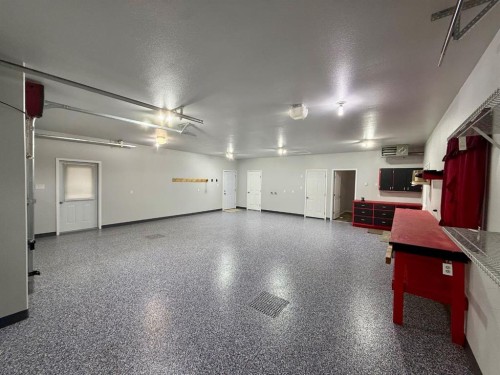 9005 Forest St, La Crete, AB - Indoor Photo Showing Garage