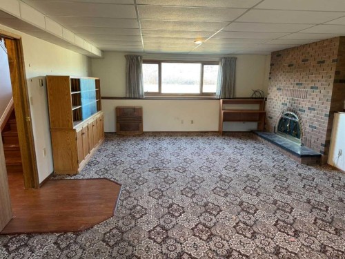 7305 96 Street, Peace River, AB - Indoor With Fireplace