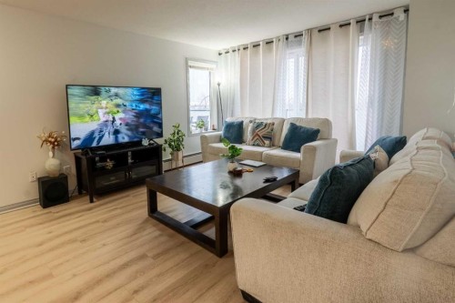 401-9120 96 Avenue, Grande Prairie, AB - Indoor Photo Showing Living Room