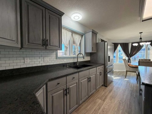 829 Cherry Street, Beaverlodge, AB - Indoor Photo Showing Kitchen With Double Sink