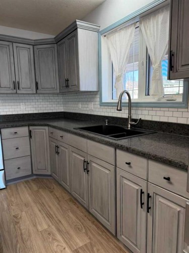 829 Cherry Street, Beaverlodge, AB - Indoor Photo Showing Kitchen With Double Sink