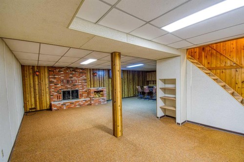 745 Cedar Street, Beaverlodge, AB - Indoor With Fireplace