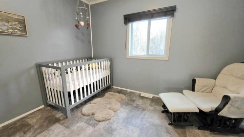 745055 Range Road 53 Unit #8, Rural Grande Prairie No. 1, County Of, AB - Indoor Photo Showing Bedroom