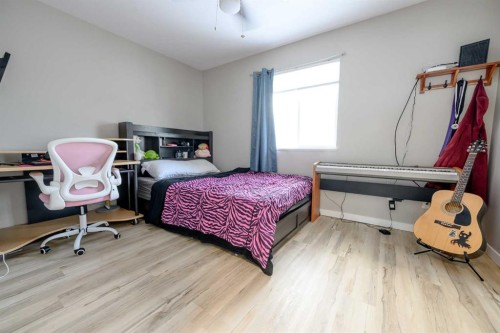 7204 105 Street, Grande Prairie, AB - Indoor Photo Showing Bedroom