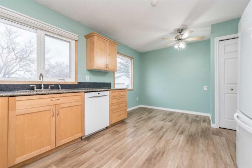 9851 80 Avenue, Grande Prairie, AB - Indoor Photo Showing Kitchen With Double Sink