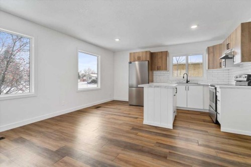 6906 97 Street, Grande Prairie, AB - Indoor Photo Showing Kitchen With Upgraded Kitchen