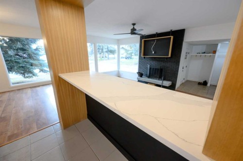 9938 87 Avenue, Grande Prairie, AB - Indoor With Fireplace