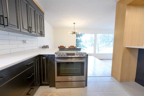 9938 87 Avenue, Grande Prairie, AB - Indoor Photo Showing Kitchen