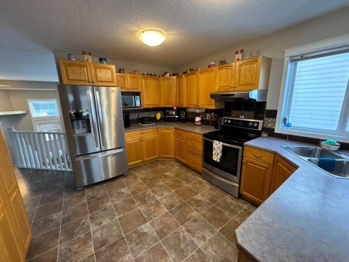 12010 105 Street, Grande Prairie, AB - Indoor Photo Showing Kitchen With Double Sink