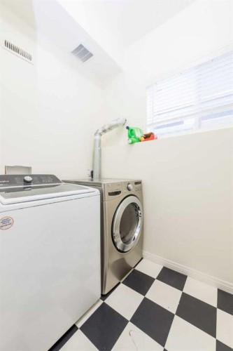 8905 Lakeland Drive, Grande Prairie, AB - Indoor Photo Showing Laundry Room