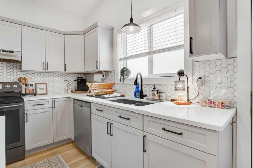 10609 114A Street, Grande Prairie, AB - Indoor Photo Showing Kitchen With Double Sink