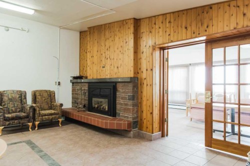 5230 44 Avenue, Spirit River, AB - Indoor With Fireplace