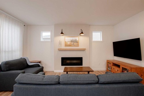 9617 89A Street, Grande Prairie, AB - Indoor Photo Showing Living Room With Fireplace