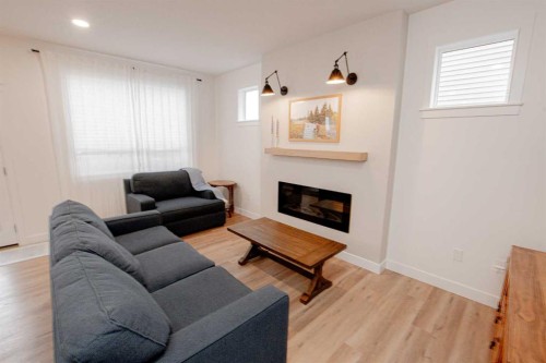 9617 89A Street, Grande Prairie, AB - Indoor Photo Showing Living Room With Fireplace