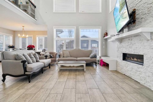 11329 Tamarack Drive, Grande Prairie, AB - Indoor Photo Showing Living Room With Fireplace
