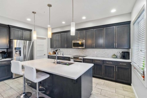 11329 Tamarack Drive, Grande Prairie, AB - Indoor Photo Showing Kitchen With Double Sink With Upgraded Kitchen