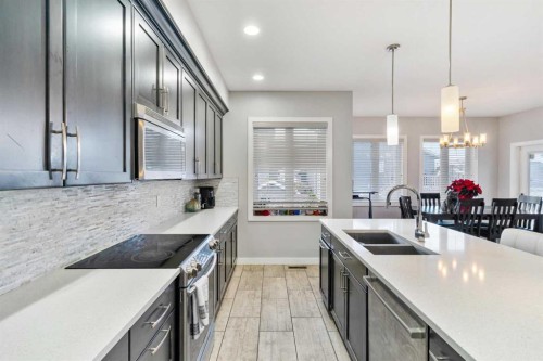 11329 Tamarack Drive, Grande Prairie, AB - Indoor Photo Showing Kitchen With Double Sink With Upgraded Kitchen
