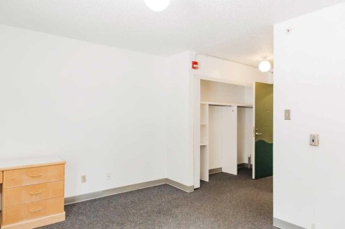 1-5230 44 Avenue, Spirit River, AB - Indoor Photo Showing Other Room