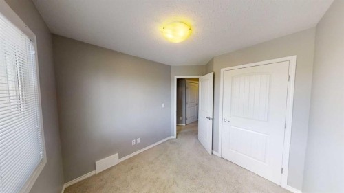 129-9105 91 Street, Grande Prairie, AB - Indoor Photo Showing Other Room