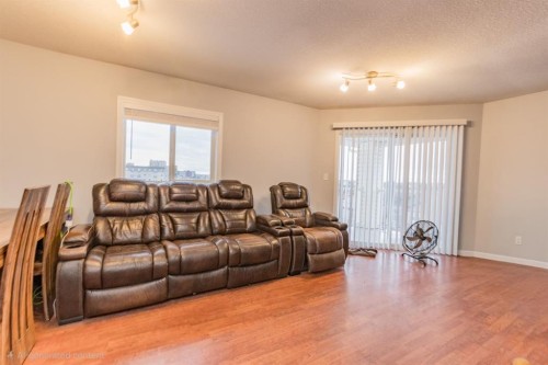 #414-11240 104 Avenue, Grande Prairie, AB - Indoor Photo Showing Living Room