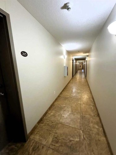 210-9810 96 Street, Grande Prairie, AB - Indoor Photo Showing Other Room