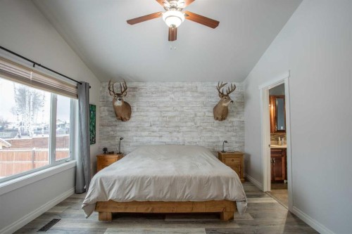 2 Black Spruce Drive, High Level, AB - Indoor Photo Showing Bedroom