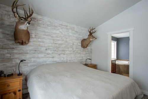 2 Black Spruce Drive, High Level, AB - Indoor Photo Showing Bedroom