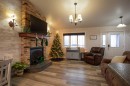2 Black Spruce Drive, High Level, AB  - Indoor Photo Showing Living Room With Fireplace 