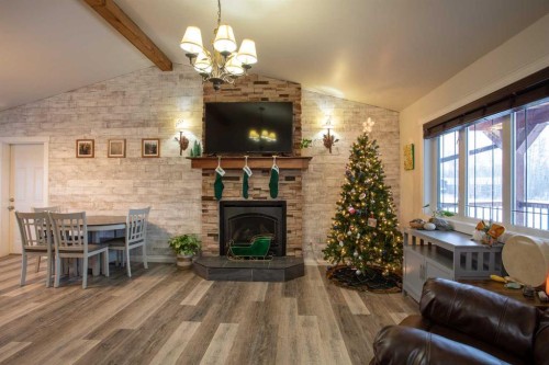 2 Black Spruce Drive, High Level, AB - Indoor With Fireplace