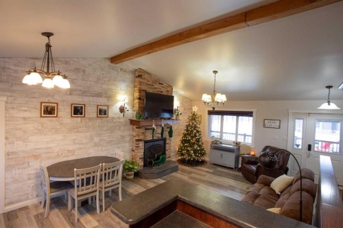 2 Black Spruce Drive, High Level, AB - Indoor Photo Showing Other Room With Fireplace