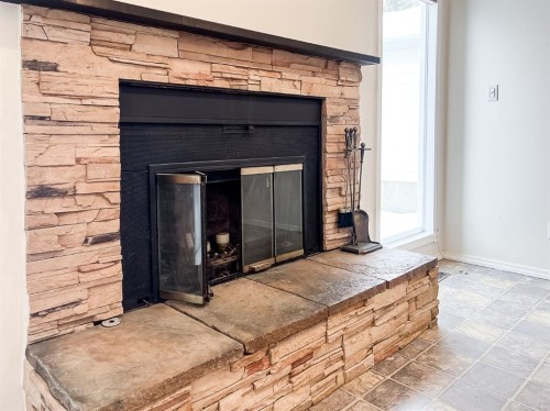 9423 125 Avenue, Grande Prairie, AB - Indoor Photo Showing Other Room With Fireplace