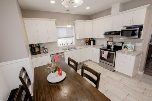 13409 104B Street, Grande Prairie, AB - Indoor Photo Showing Kitchen With Double Sink