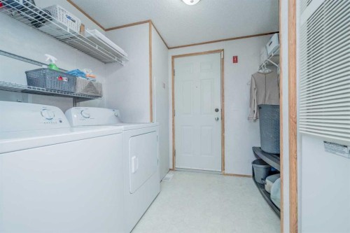9703 111 Avenue, Clairmont, AB - Indoor Photo Showing Laundry Room