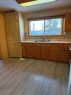 10323 98 Avenue, High Level, AB  - Indoor Photo Showing Kitchen With Double Sink 