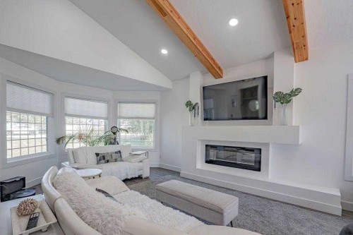 12809 92 Street, Peace River, AB - Indoor Photo Showing Living Room With Fireplace