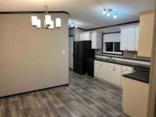 19 4 Street West, Faust, AB - Indoor Photo Showing Kitchen With Double Sink