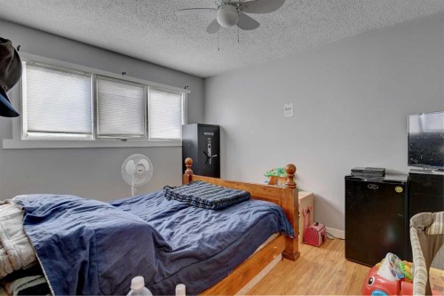 9809 98 Avenue, Sexsmith, AB - Indoor Photo Showing Bedroom