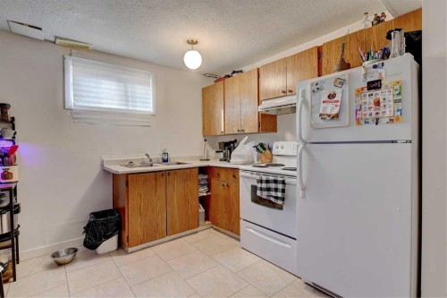 9809 98 Avenue, Sexsmith, AB - Indoor Photo Showing Kitchen With Double Sink