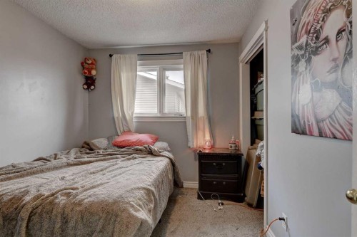 9809 98 Avenue, Sexsmith, AB - Indoor Photo Showing Bedroom