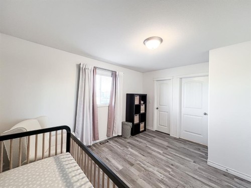 11218 Pinnacle Drive, Grande Prairie, AB - Indoor Photo Showing Bedroom