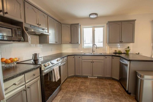 23 Beaver Ranch Drive, High Level, AB - Indoor Photo Showing Kitchen With Stainless Steel Kitchen With Double Sink