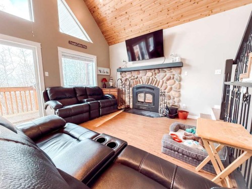 Block 6 Lot 7, Rural Big Lakes County, AB - Indoor Photo Showing Living Room With Fireplace