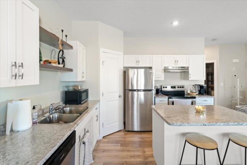 9601 114 Avenue, Clairmont, AB - Indoor Photo Showing Kitchen With Double Sink With Upgraded Kitchen