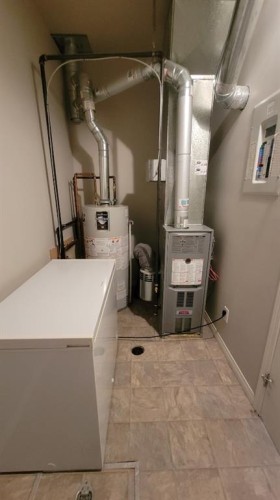 101C-8640 103 Avenue, Grande Prairie, AB - Indoor Photo Showing Laundry Room