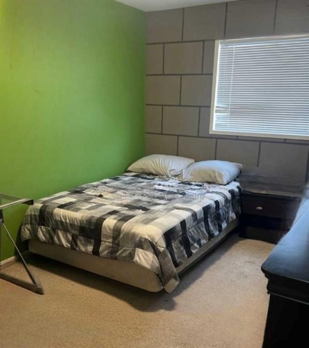 10907 97 Street, Clairmont, AB - Indoor Photo Showing Bedroom