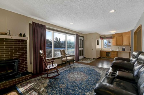 5204 48 Street, Valleyview, AB - Indoor Photo Showing Living Room With Fireplace