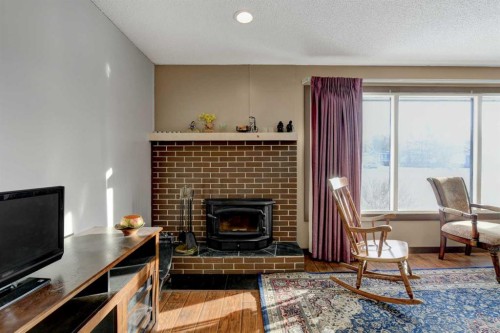 5204 48 Street, Valleyview, AB - Indoor Photo Showing Living Room With Fireplace