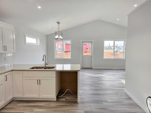 9211 94A Avenue, Wembley, AB - Indoor Photo Showing Kitchen With Double Sink